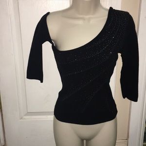 One sleeve off the shoulder sweater